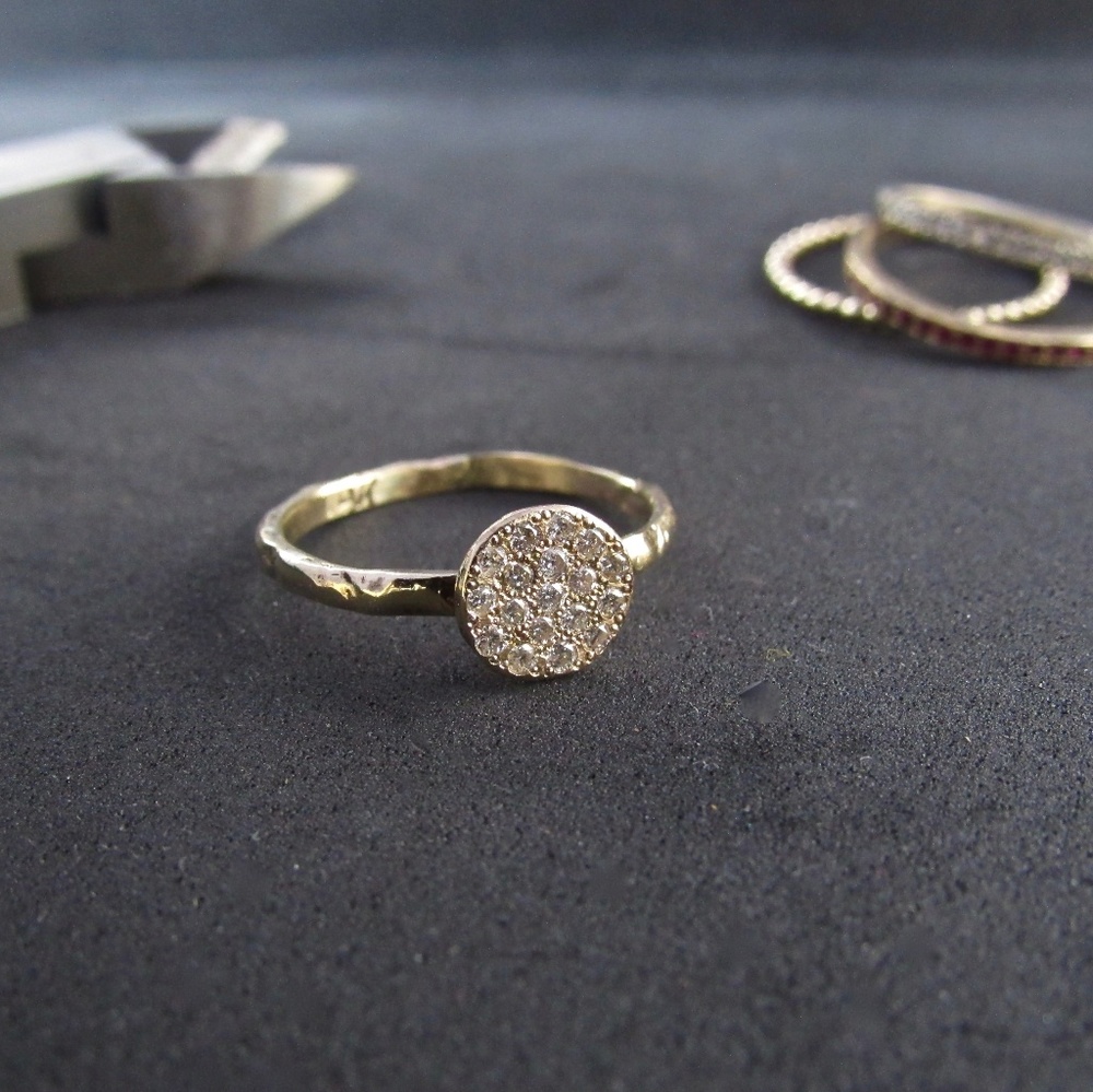 Gold diamonds ring.